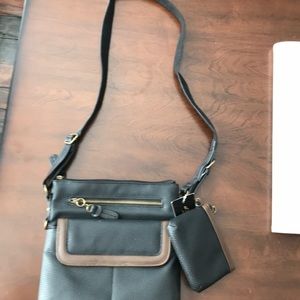 Never used black and brown cross body purse
